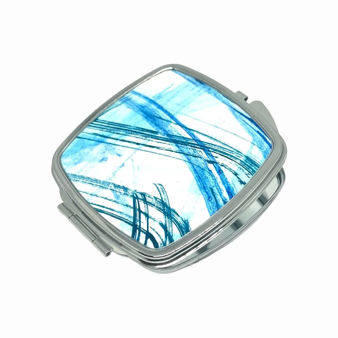 Compact Mirror Blue waves